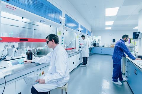 Researchers working in a lab