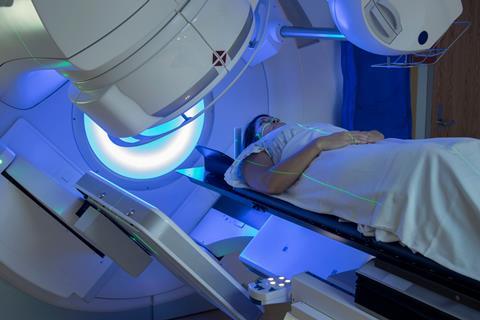 Woman receiving radiation therapy treatments for breast cancer