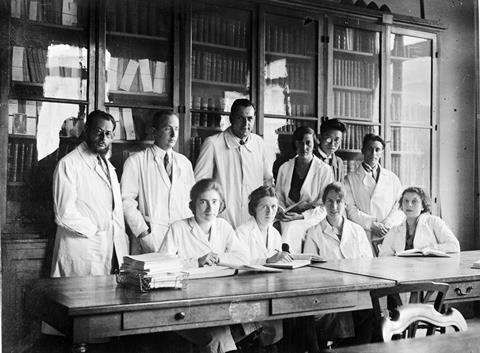 An image showing Marguerite Perey and colleagues