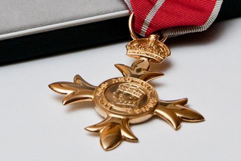 An image of an OBE medal 
