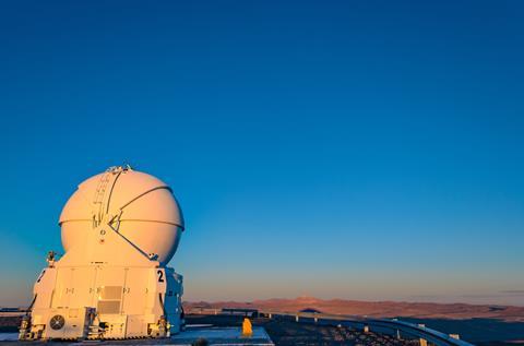 A photograph of an auxiliary telescope in the Atacama desert, Chile