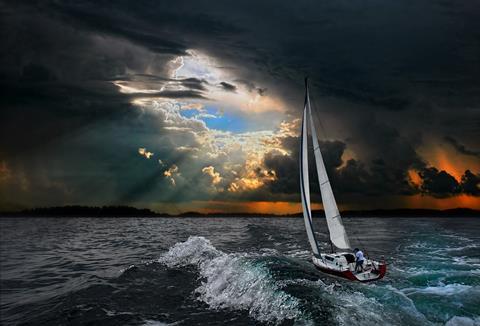 Sailboat in the stormy sea