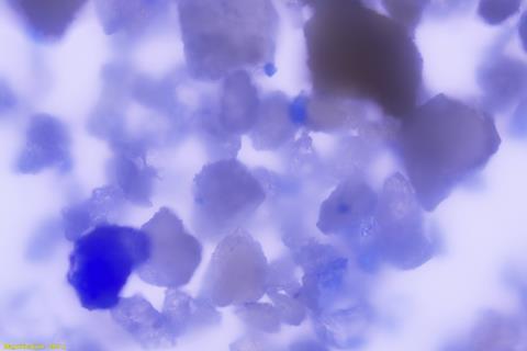 A picture of a magnified lapis lazuli particle