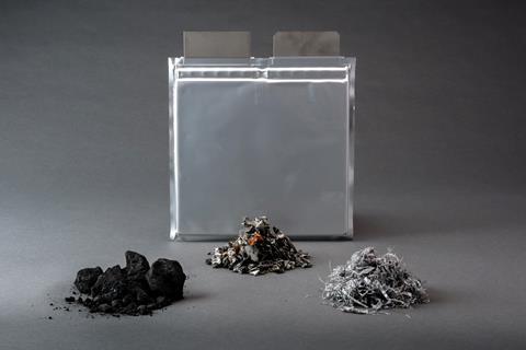 A photo showing the materials from a shredded battery