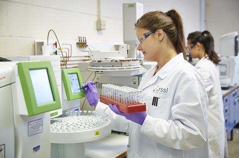 RSSL researchers perform analysis in the lab
