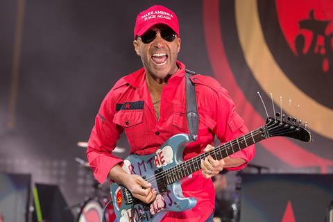 Tom Morello playing guitar on stage with Prophets of Rage