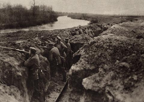 German troops holding a first-line trench on the river bank