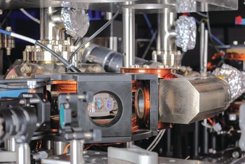 The experimental apparatus and the supporting optical components for the production and manipulation of a quantum gas of polar molecules (KRb)