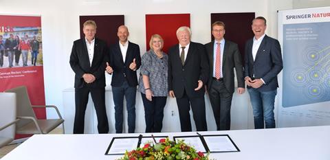 An image showing the representatives of PROJEKT DEAL and SPRINGER NATURE, who reached understanding on world´s largest transformative Open Access agreement