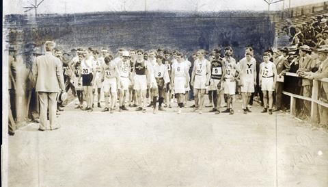 1904 Olympics: Runners lined up at start of Marathon Race, receiving instructions immediately prior to start.