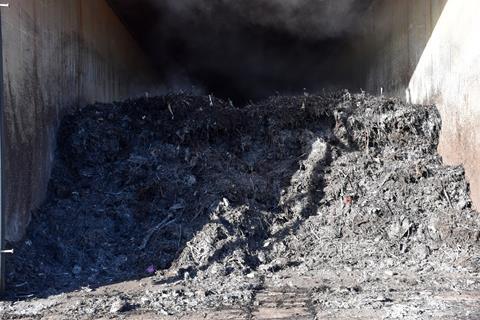 Composting waste at a central facility