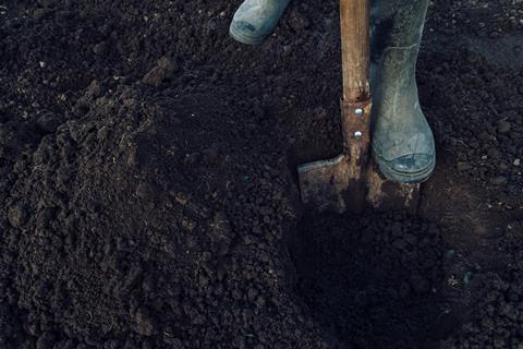 Digging a hole in soil