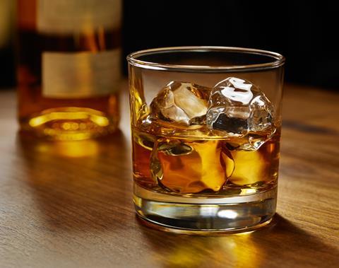 Kentucky bourbon in a glass with ice