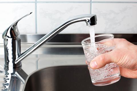 A glass of water poured from a kitchen tap   Copy