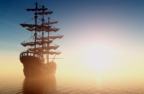 old ship sailing in the mist 