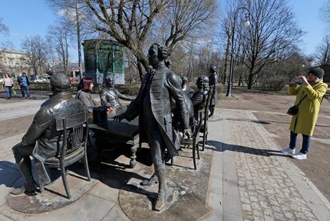 Photograph showing people posing with sculptures in Alexander Park, St Petersburg, Russia