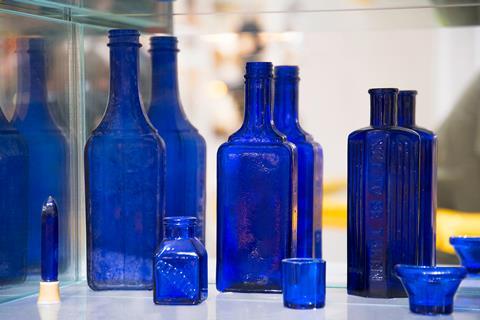 An assortment of cobalt blue glass bottles