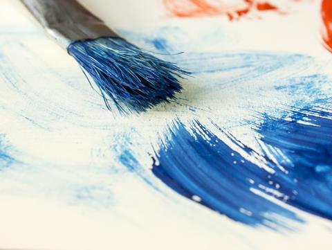 Brush on white paper with red and blue paint 