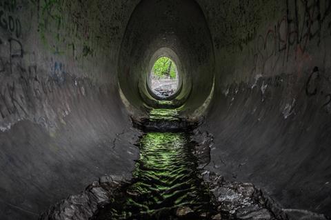 Exit from the drainage sewage tunnel pipe