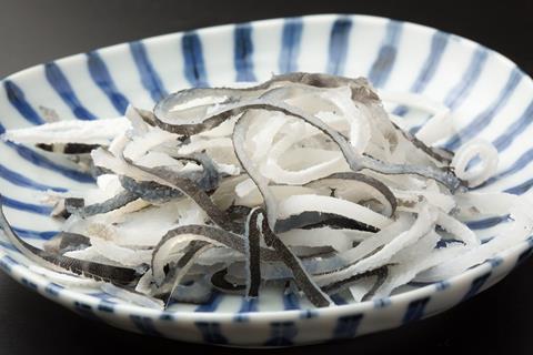 slices of pufferfish skin sashimi 