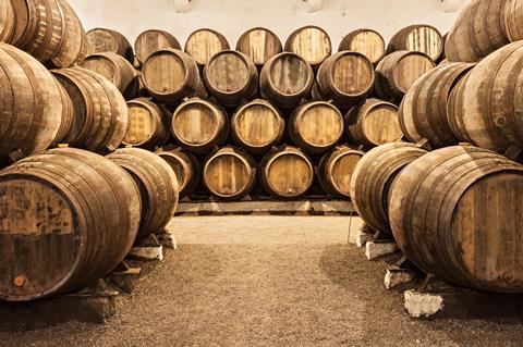 Barrels in a wine cellar in Porto