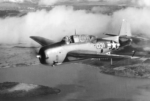 An image showing Jimmy Robinson flying in an airplane