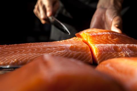 Chef preparing salmon