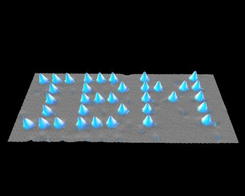 IBM logo written in xenon atoms