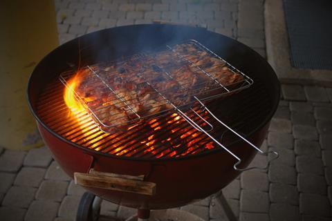 Barbecue grill with flames 