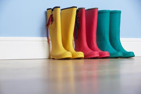 Colourful wellington boots on the floor