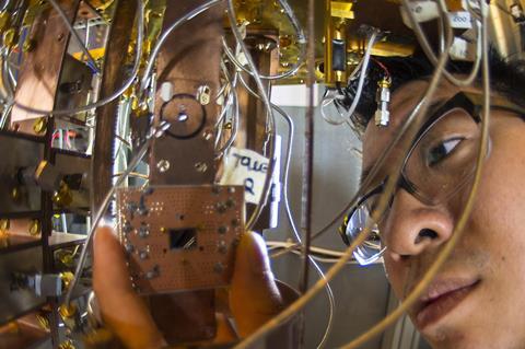 IBM commercial quantum computer, showing IBM scientist Jerry Chow 