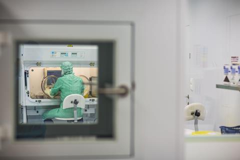 An image showing a virus antidote being prepared in a biochem lab